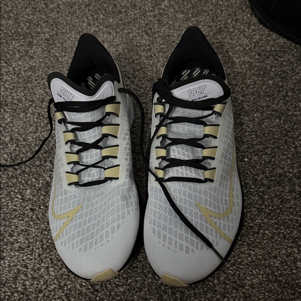 New Orleans Saints Nike White and Black Running Shoes with Gold Accents